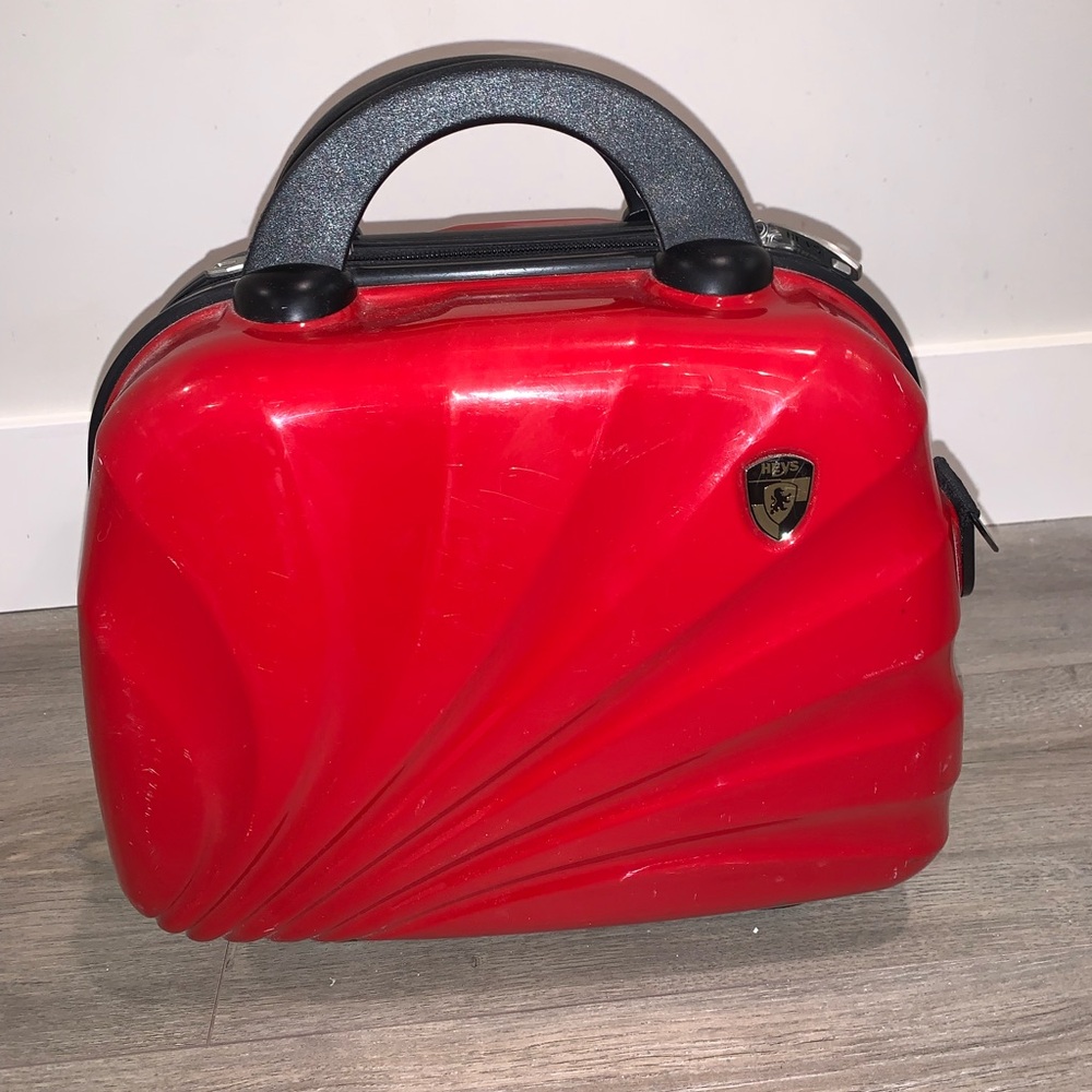 Red Hard Shell Carry-On Bag
